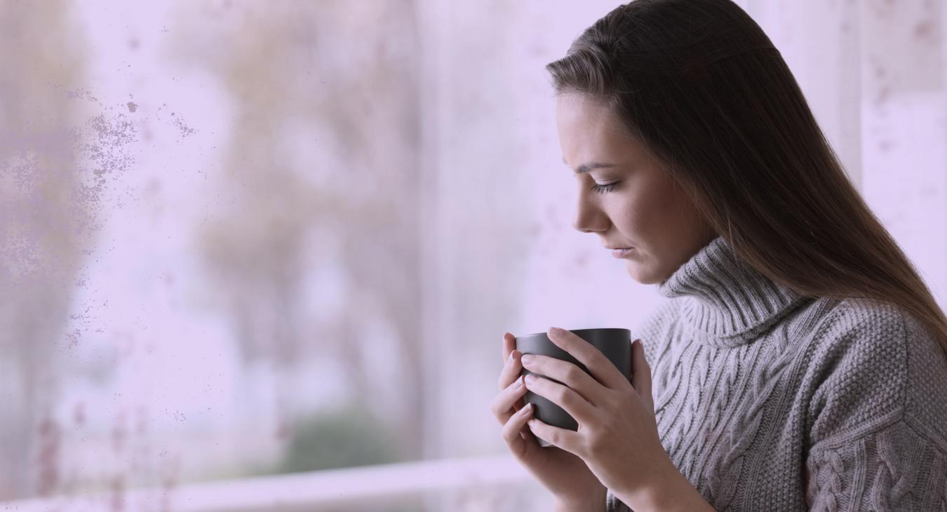 Woman window coffee